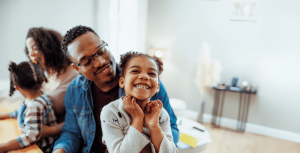 Young family with parents and two small children