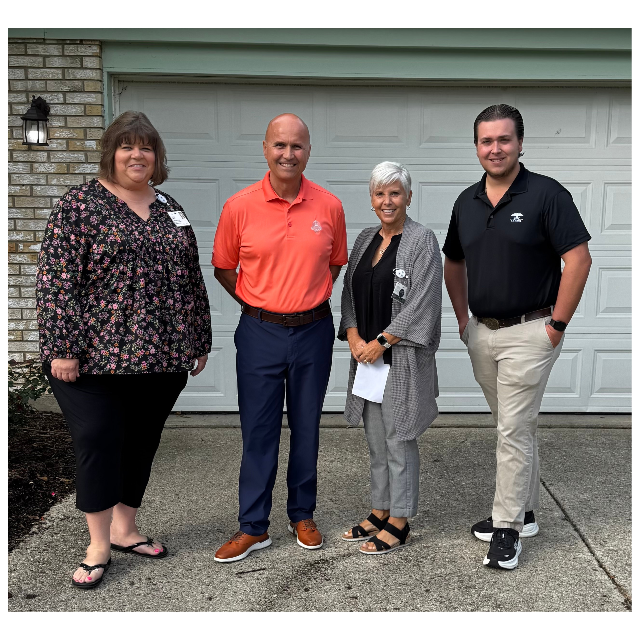 Cari Oehlenschlager, Steve Leary, Deb Lyle, and Hayden Ferguson at the Graceworks Enhanced Living visit